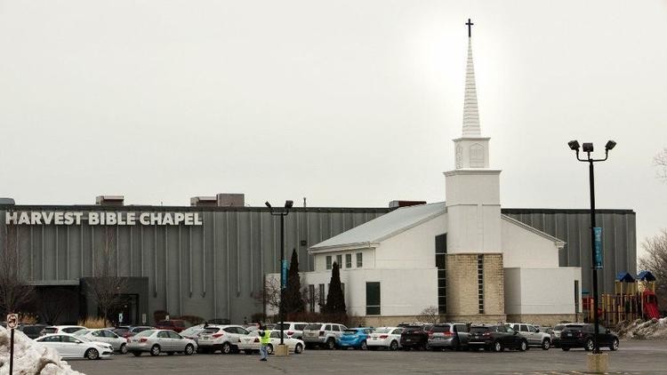 Announcement of sweeping changes at Harvest Bible Chapel met with walkout, concerns about new direction