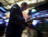 A trader works on the floor of the New York Stock Exchange in the Manhattan borough of New York